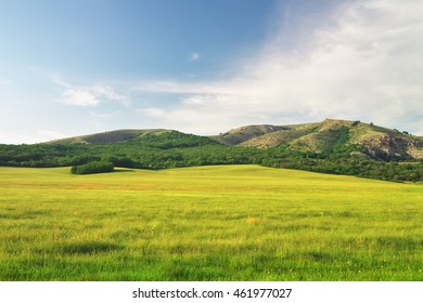 Green meadow in mountain and blue sky. Composition of nature.
 - Powered by Shutterstock