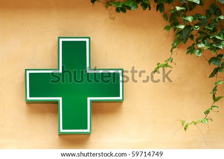 Green medical cross sign