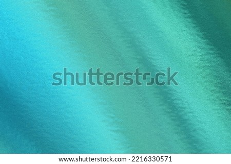 Green metallic wall with scratched surface, abstract texture background