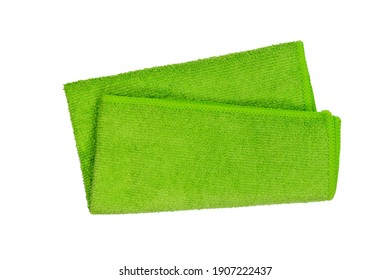 Green micro fiber towel isolated on white background. Clean, new green microfiber cloth isolated on white background