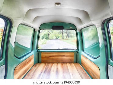 Green Microvan With Wood Paneling