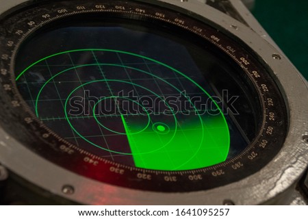 Green military radar screen with unknown target dot - Safety equipment.