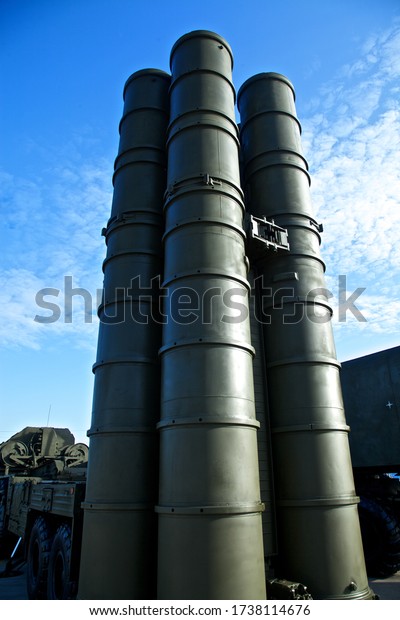 Green military\
rocket launchers in the\
sky