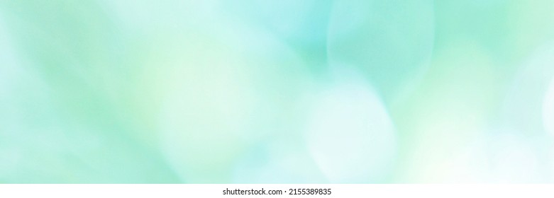 Green Mint Leaf background. Blurred leaves and circular bokeh. Abstract backdrop for wallpaper and design