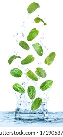 Green Mint Leaves Falling Into Clear Water On White Background