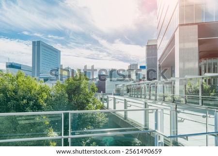 Green modern city. office building connection bridge walking space with green tree in city urban area landscape,.