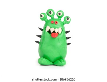 Green Monster of plasticine isolated on white