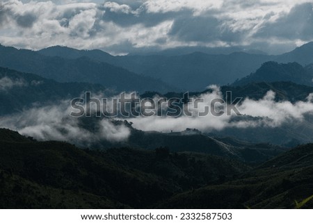 Green mountains and cloudy eason with a beautiful view.