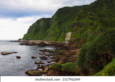 Green Mountains Next To The Ocean In Taiwan