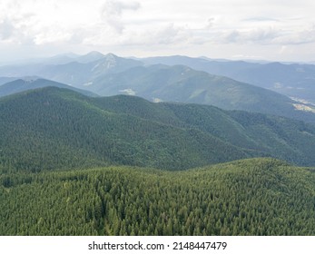 Green mountains of Ukrainian Carpathians in summer. Aerial drone view. - Powered by Shutterstock