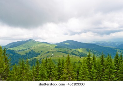 green mountains under the clouds