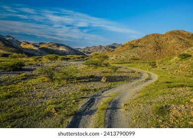 Green mountains in the United Arab Emirates - Powered by Shutterstock