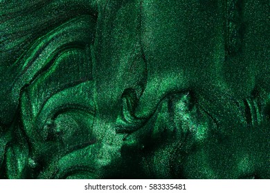 Green nail polish pattern.