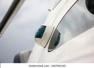 Green Navigation Light On Right Board Of Motor Boat Close Up