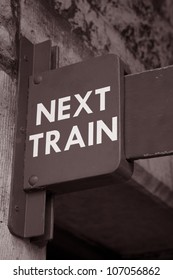 Green Next Train Sign At Railway Station