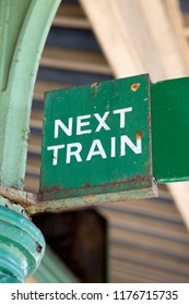 Green Next Train Sign At Railway Station