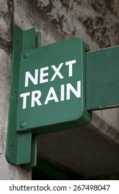 Green Next Train Sign At Railway Station