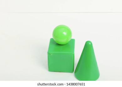 green objects on white background