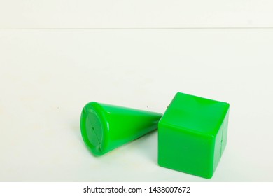 green objects on white background