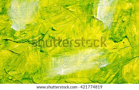 Green oil abstract background painting, green acrulic paint on a palette. Close up. Acrylic painting on canvas. Modern art, contemporary art.