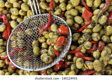 Green Olive Pickels In Brine On A Market