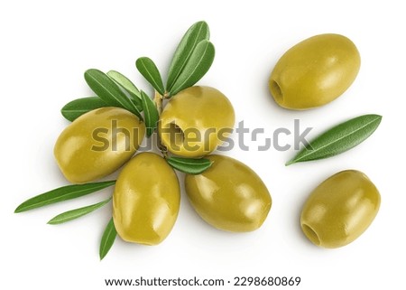 Green olives with leaves isolated on a white background with full depth of field. Top view. Flat lay