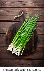 Green Onion Or Scallion On Wooden Board, Fresh Spring Chives