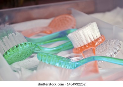 Green And Orange Brushes For Hardware Manicure And Pedicure In Desk Drawer, Dry After Sterilization