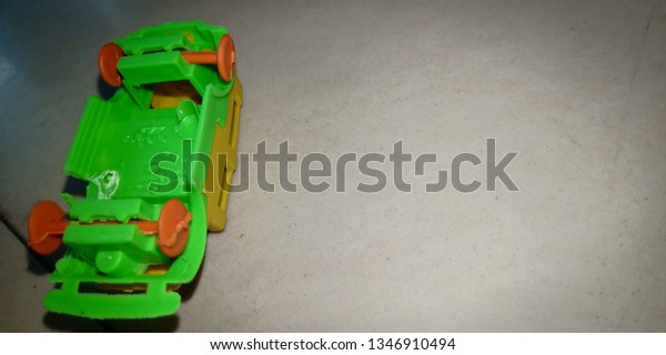 Green and orange\
Toy