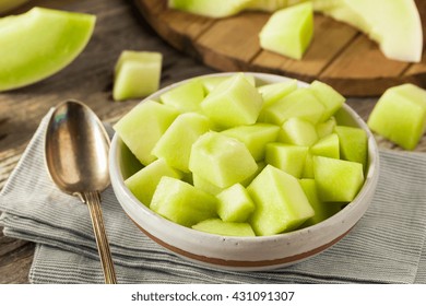 Green Organic Honeydew Melon Cut In A Bowl