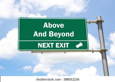 Green Overhead Road Sign With An Above And Beyond Next Exit Concept Against A Partly Cloudy Sky Background.