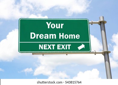 Green Overhead Road Sign With A Your Dream Home Next Exit Concept Against A Partly Cloudy Sky Background.