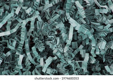 Green paper background texture shredded and crimped