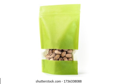 Green Paper Standup Pouch Filled With Dry Fruit, Flexible Packaging With Window Zipper On White Background