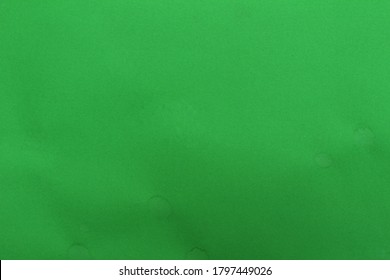 green paper texture background and have copy space for design in your work.