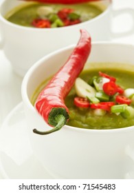 Green Pea Soup With Chili Pepper. Shallow Dof.