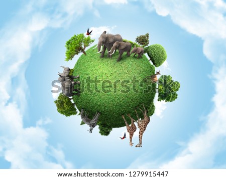 Green peace earth, miniature planet, globe concept showing a green, peaceful and animals herbivore life 