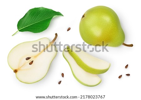 Green pear fruit with half and slices isolated on white background. Top view. Flat lay