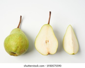 Green pear with a leaf isolated on white. Pear Clipping Path. Professional studio photo    