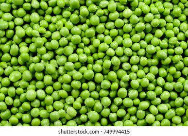 Green Peas. Green background. Peas background. Top view. - Shutterstock ID 749994415