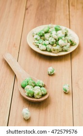 Green Peas Crispy Baked Coated By Iodised Salt On Wooden Spoon