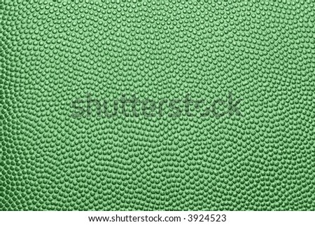 A green pebble-grained texture background