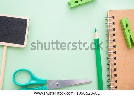 green pencilsgreen wooden clippersblank business signnote stock