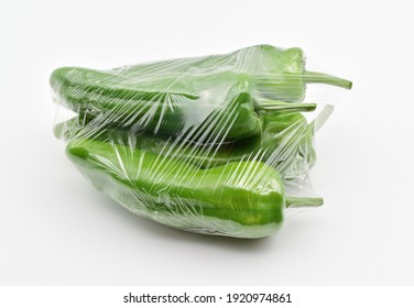 Green Peppers In A Freezer Bag Isolated On White Background