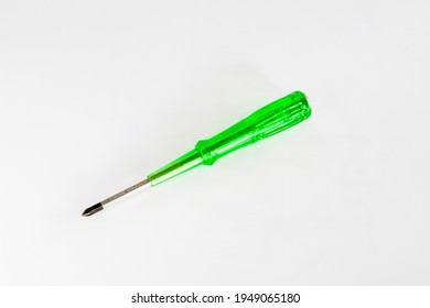 Green Phillips screwdriver isolated on white background