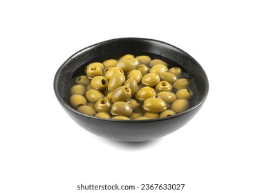 Green Pickled Olives in Black Bowl. Pitted Fermented Olives, Marinated Mediterranean Snack, Olive Pickles on White Background - Powered by Shutterstock