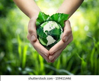 Green planet in your heart hands - usa - environment concept  - Shutterstock ID 159411446