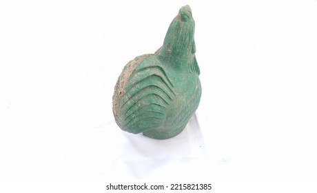 Green Plastic Chicken Piggy Bank Isolated On A White Background, Piggy Bank In The Shape Of A Chicken With A Dirty (dirty) Look.