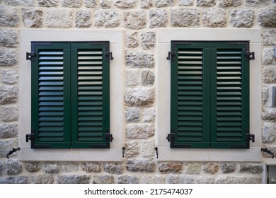 Green Plastic Shutters On Windows, Home Improvement Concept