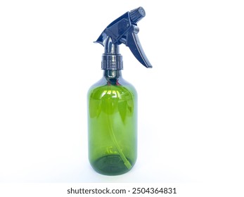 A green plastic spray bottle with a black nozzle against a clean white background. It has a sleek and minimalist design, it is used for various uses such as cleaning, gardening or personal care. - Powered by Shutterstock